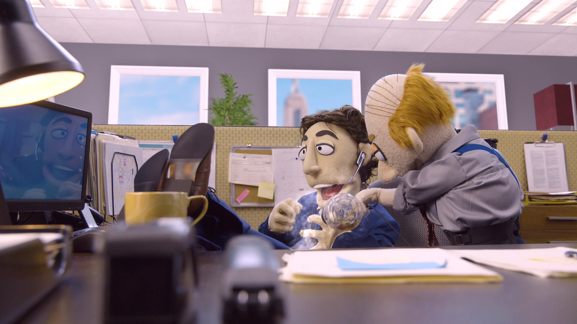 Kevin Nealon's puppet gets hot coffee poured on him in a sketch directed by Todd Bishop for Comedy Central's Crank Yankers