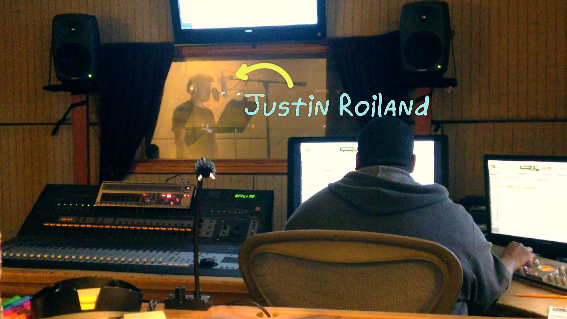 Justin Roiland records a song in a behind-the-scenes clip from the Rick and Morty season one blu-ray